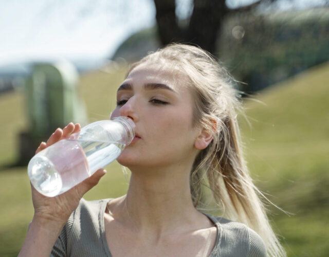 How much water should one drink daily during summer?